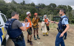 Police talking to climate protestors at the Stockton mine.