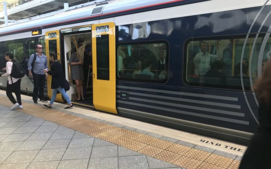 A crowded Auckland train as 'March madness', combined with a rail worker strike, begins.