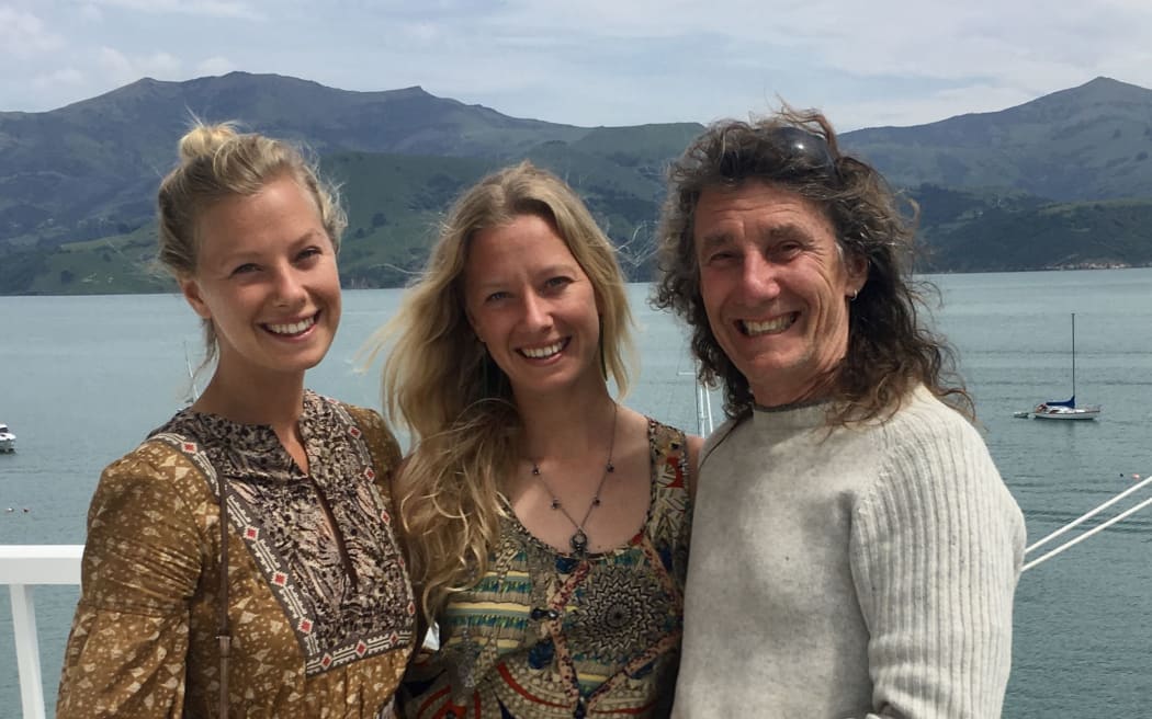 Andrew Milne with his twin daughters Alice and Sorrel O'Connell-Milne.