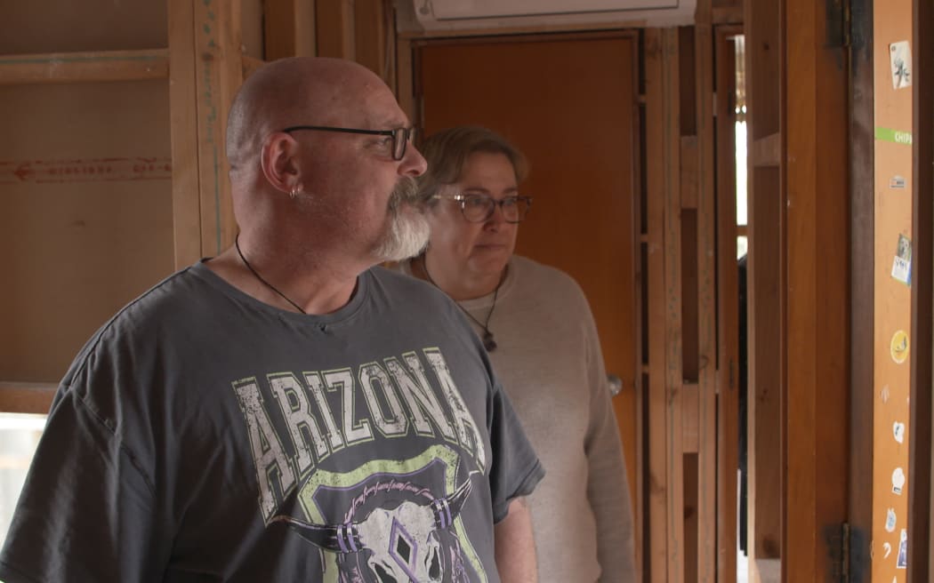 Dave and Keri Skelling, in their Ranui house, which flooded on Auckland Anniversary weekend.