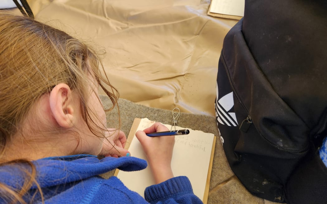 Writing in the bell tent, a "cosy and contained space for creativity"