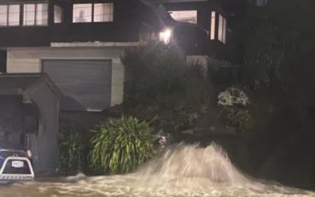 A stormwater drain gushing water on Forbury Road, St Clair.