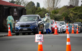 Cars lining up outside a drive through testing station, Pages Road, Christchurch.