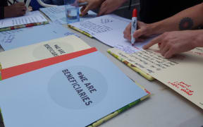 The book tells the stories of 200 people who have spent time on the benefit