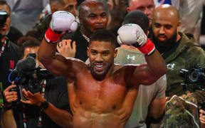 British boxer Anthony Joshua celebrates after defeating US boxer and influencer Jake Paul, 2025.
