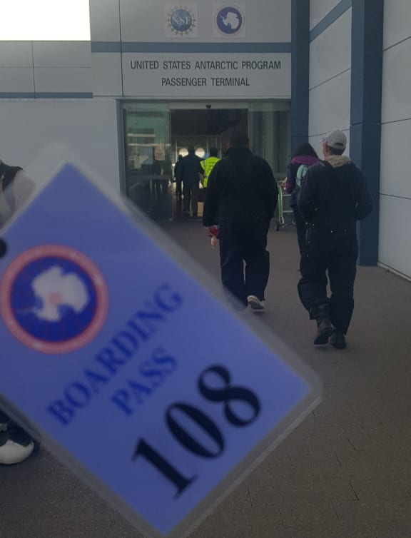 After a week's delay due to mechanical issues with the C17 Globemaster plane, Alison Ballance finally starts the boarding process to head to Antarctica.