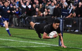 Rieko Ioane scores a try during the Rugby Championship test match rugby union.