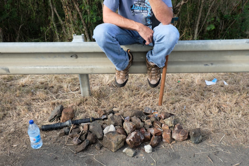 Roads had been blocked by demonstrators, some equipped with bats and rocks