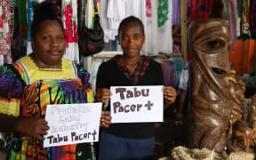 Women vendors in Vanuatu who strongly oppose Pacer-Plus.