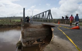 A bridge outside the Vanuatu capital of Port Vila damaged by Cyclone Pam.