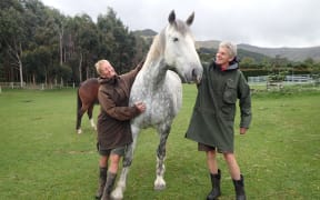 Karin Bos and Tineke van de Heide with one of their horses.