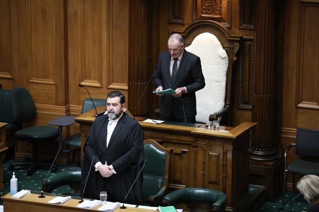 Speaker Trevor Mallard begins Parliament's day with a prayer as Clerk of the House David Wilson listens from The Table
