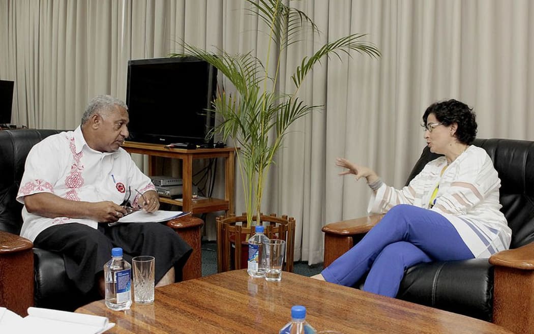 Fiji's PM Frank Bainimarama meets the head of the International Trade Centre, Arancha Gonzalez.