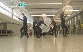 An interpretative dance welcoming trans-Tasman travellers at Melbourne Airport