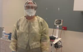 Those caring for Ebola patients would be wearing full lightweight waterproof gowns, with hats, visors, masks and double gloves.