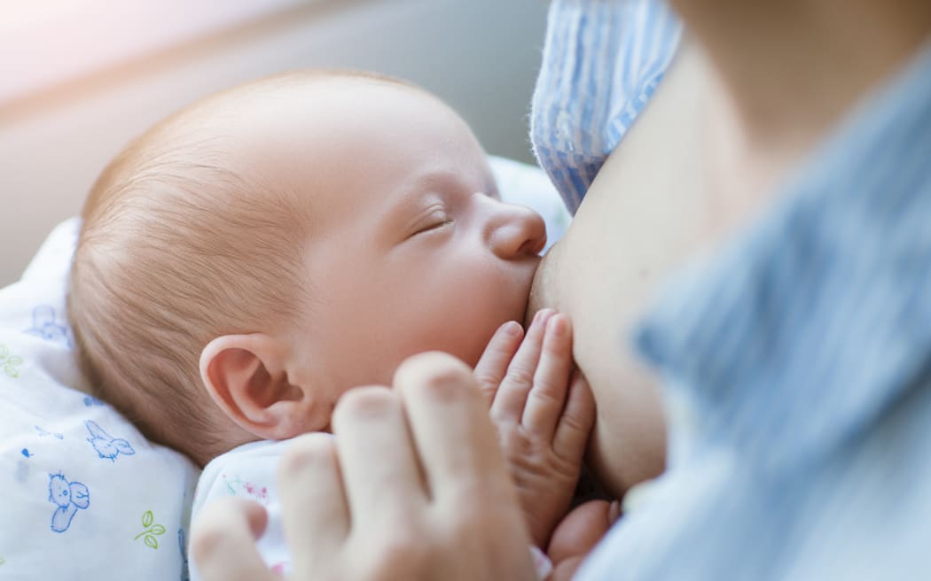 breastfeeding for newborns motherhood concept. helpful tips for feeding the baby. love and tenderness.