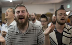 Jewish students in the settlement of Gush Etzion in the West Bank pray for the missing teenagers.