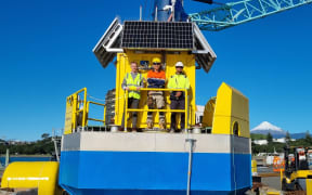 Giacomo Caleffi, Gail Debuire,engineer with GEPS Technology, and Lich Tran, project manager, Akrocean.