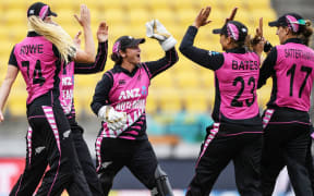The White Ferns celebrate a wicket in the first T20 against India.