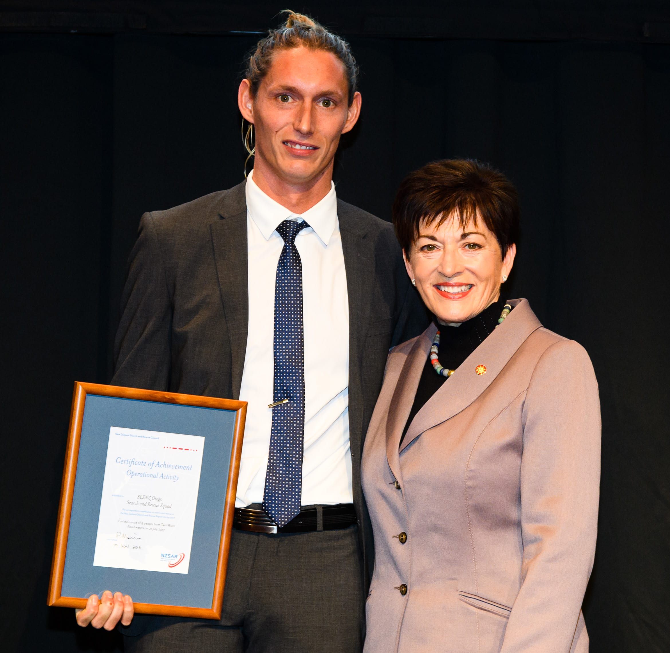Otago Surf Life Saving SAR crew squad member Issac Davies with Dame Patsy Reddy