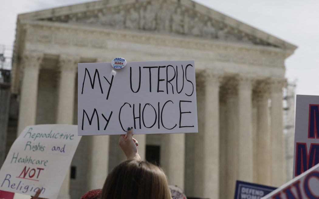 WASHINGTON, DC - MARCH 26: Demonstrators participate in a abortion-rights rally outside the Supreme Court as the justices of the court hear oral arguments in the case of the U.S. Food and Drug Administration v. Alliance for Hippocratic Medicine on March 26, 2024 in Washington, DC. The case challenges the 20-plus-year legal authorization by the FDA of mifepristone, a commonly used abortion medication.   Anna Moneymaker/Getty Images/AFP (Photo by Anna Moneymaker / GETTY IMAGES NORTH AMERICA / Getty Images via AFP)