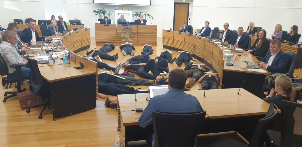 The Extinction Rebellion demonstration at Christchurch City Council during a meeting this morning.