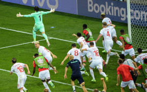 Switzerland celebrate beating France in a penalty shootout in their round of 16 match at Euro 2020 in Bucharest.
