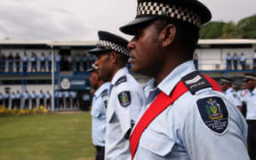 Solomon Islands Police officers at the official limited-rearmament ceremony marking the first time in 14 years that RSIPF officers gave been allowed to carry guns.