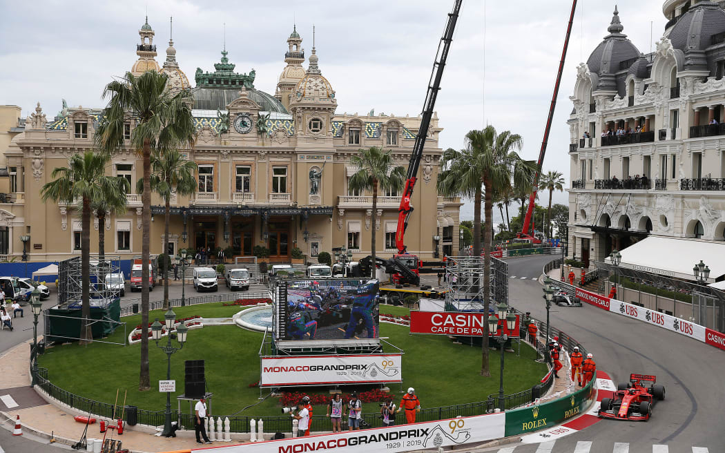 Formula One cars race past the Monte Carlo casino