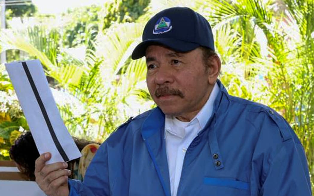Handout picture released by Nicaragua's presidency press office of Nicaragua's President and presidential candidate Daniel Ortega ready to cast his vote during the general election, in Managua, Nicaragua on November 07, 2021.