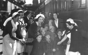 Polish children and Red Cross nurses (1944)