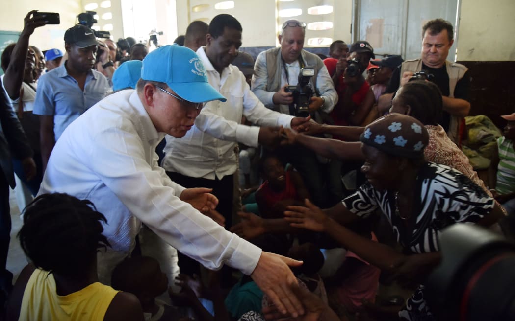 UN secretary general Ban Ki-moon visit a shelter in the Lycee Phillipe Guerrier in the city of Les Cayes in the wake of Hurricane Matthew.