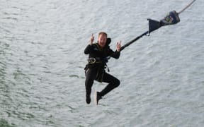 Mike Heard during a bungy jump from the Auckland Harbour Bridge.
