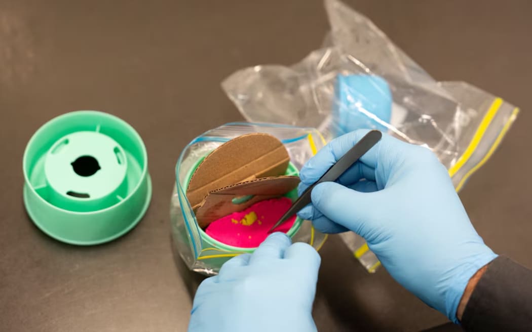 Coloured sand samples across the country are being tested for traces of asbestos.  (ABC News: Cason Ho)