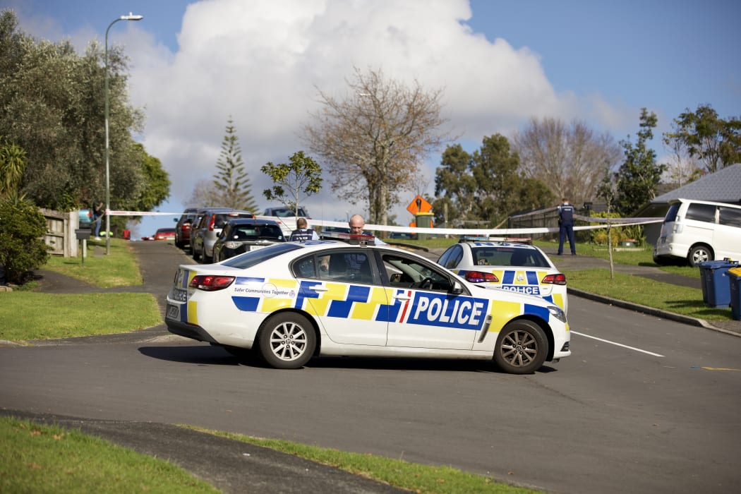 Officers at the scene of a police shooting in Massey, Wellington, 19 June 2020.