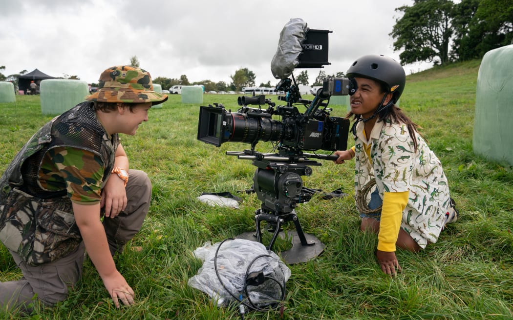 Terence Daniel and Reuben Francis on set.