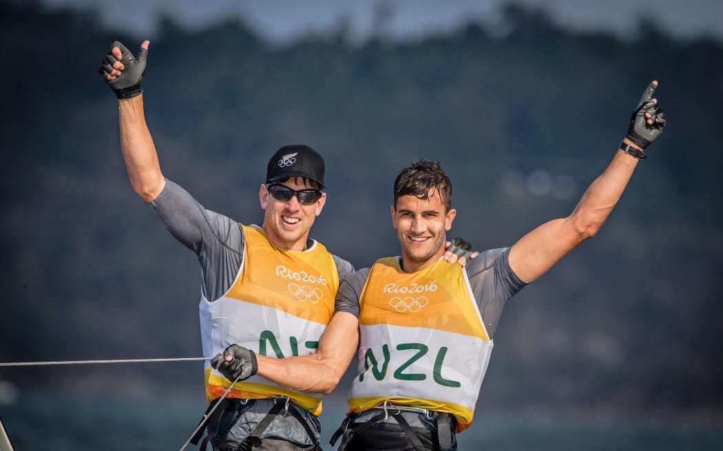 New Zealand sailors Peter Burling and Blair Tuke celebrate winning Olympic gold in the 49er class Rio 2016.