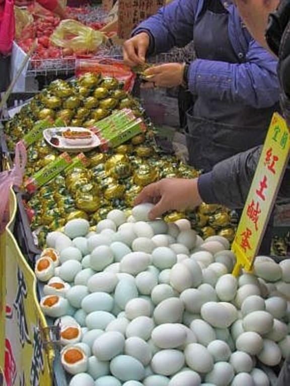 Farmers struggle not to waste food as they get their goods to a market stall like this one selling salted duck eggs in Taiwan.