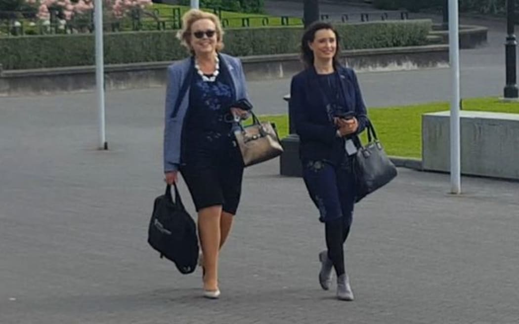 Police Minister Judith Collins, left, arrives at Parliament.