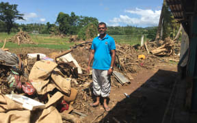 Mohammed Shamim stands by his house near Ba which was devasted during April cyclones