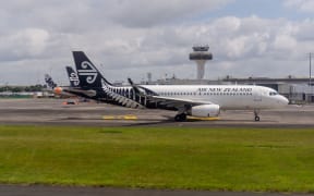 An Air New Zealand aircraft parked at Auckland airport.