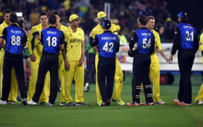 The two team shake hands after Australia beat New Zealand in the final of the 2015 Cricket World Cup.