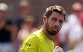 NEW YORK, NEW YORK - SEPTEMBER 03: Cameron Norrie of Great Britain celebrates after defeating Holger Rune of Denmark during their Men's Singles Third Round match on Day Six of the 2022 US Open at USTA Billie Jean King National Tennis Center on September 03, 2022 in the Flushing neighborhood of the Queens borough of New York City.   Julian Finney/Getty Images/AFP (Photo by JULIAN FINNEY / GETTY IMAGES NORTH AMERICA / Getty Images via AFP)