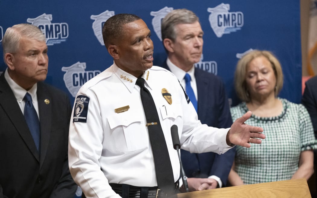 CHARLOTTE, NORTH CAROLINA - APRIL 30: Charlotte Police Chief Johnny Jennings speaks to reporters during a press conference April 30, 2024 in Charlotte, North Carolina. Four members of law enforcement were shot and killed the previous day while serving a warrant at a residence in Charlotte. Police fatally shot the suspect, identified as 39-year-old Terry Clark Hughes Jr. who was wanted for possession of a firearm by a felon and two counts of felony flee to elude out of Lincoln County, North Carolina.   Sean Rayford/Getty Images/AFP (Photo by Sean Rayford / GETTY IMAGES NORTH AMERICA / Getty Images via AFP)