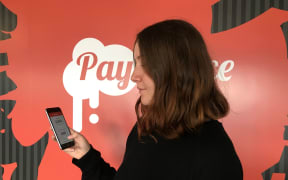 Larissa Godfrey using the Pay Sauce app