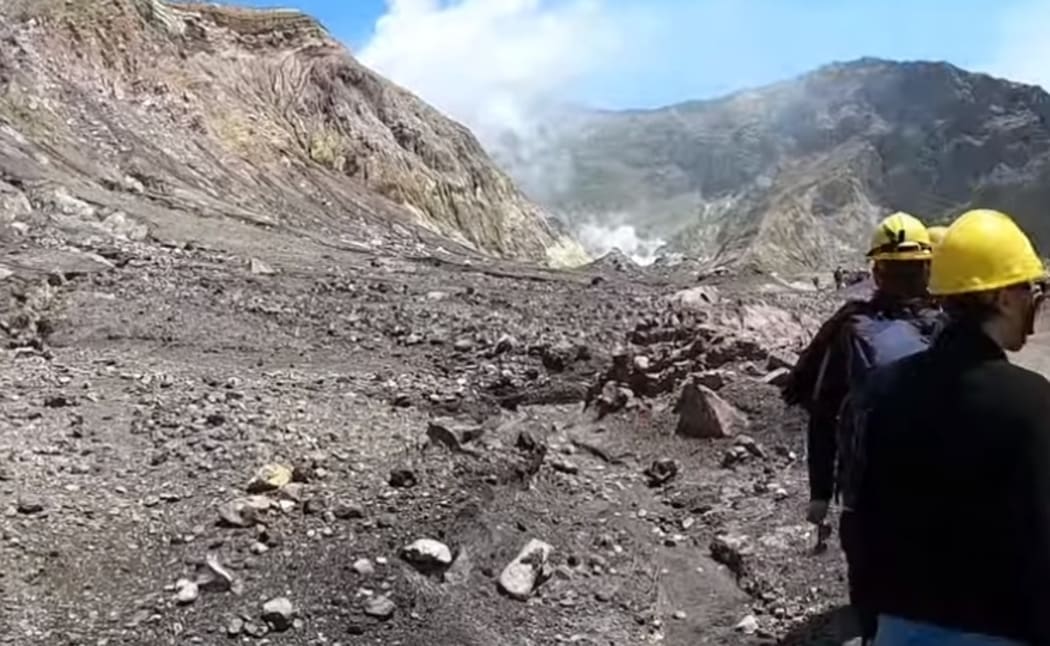 The group toured the island before finishing their trip and leaving on their boat. After they left they saw the eruption happening behind them.
