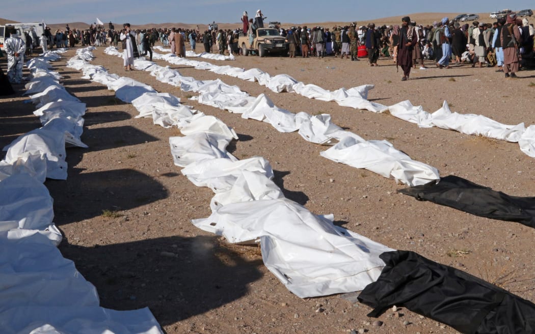 Afghan mourners prepare to offer mass funeral prayers for the people killed in a series of earthquakes in  Herat province on October 9, 2023.