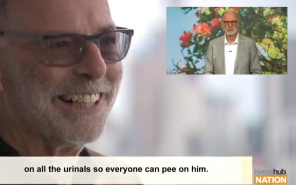 Auckland mayoral candidate Wayne Brown, right, watches footage of himself filmed earlier by Newshub Nation.