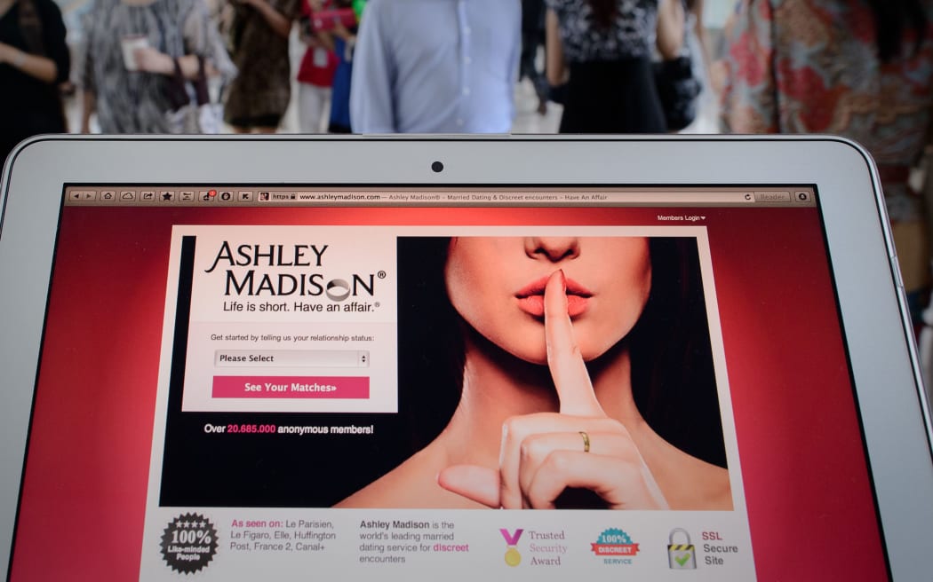 Ashley Madison website page on tablet.