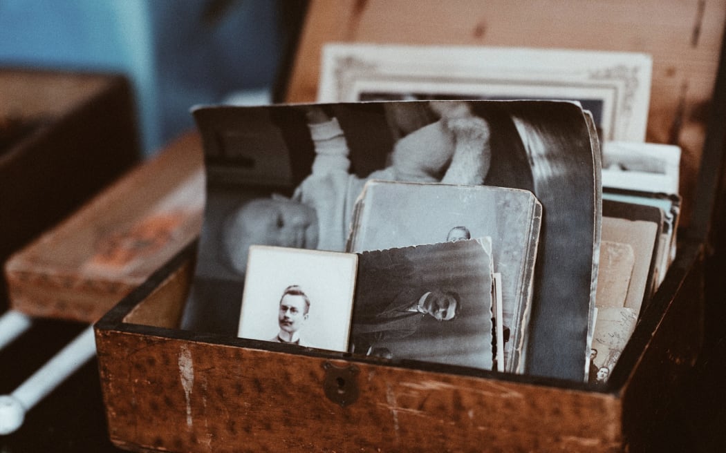A box of old sepia photos